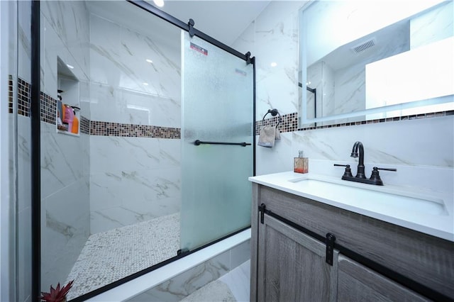 300A Andros Ave, Staten Island, NY 10303 - full bathroom with marble finish floors, a marble finish shower, vanity, and tile walls