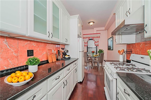 1543 W 1st St Unit D1, Brooklyn, NY 11204 - kitchen featuring white appliances, under cabinet range hood, white cabinetry, backsplash, and glass insert cabinets