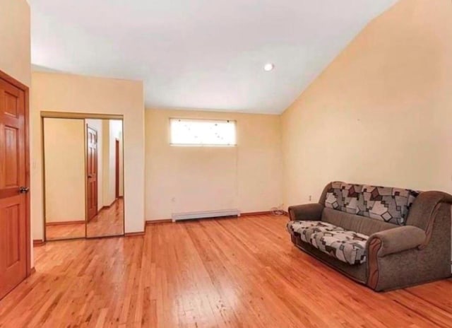 4817 Bedford Ave Unit 3A, Brooklyn, NY 11235 - living area with a baseboard radiator and light wood-type flooring
