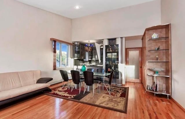 4817 Bedford Ave Unit 3A, Brooklyn, NY 11235 - dining area featuring wood finished floors and baseboards