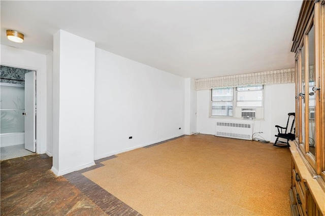 1935 Shore Pkwy Unit 8E, Brooklyn, NY 11214 - spare room with radiator heating unit and cooling unit