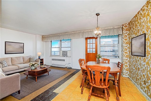 1935 Shore Pkwy Unit 8E, Brooklyn, NY 11214 - dining space with radiator, wallpapered walls, a chandelier, and cooling unit