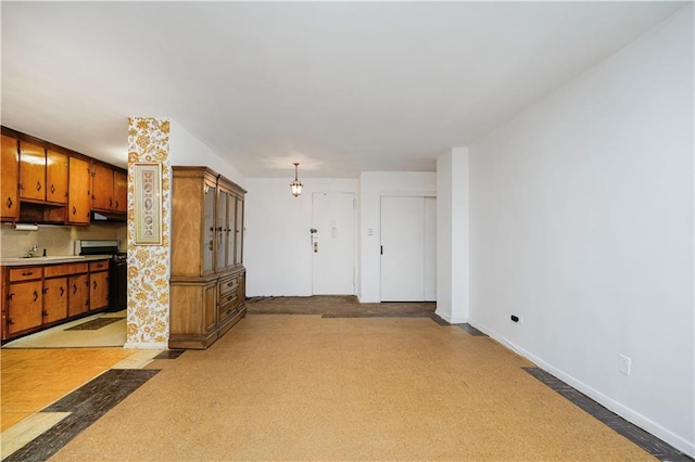 1935 Shore Pkwy Unit 8E, Brooklyn, NY 11214 - unfurnished living room with baseboards