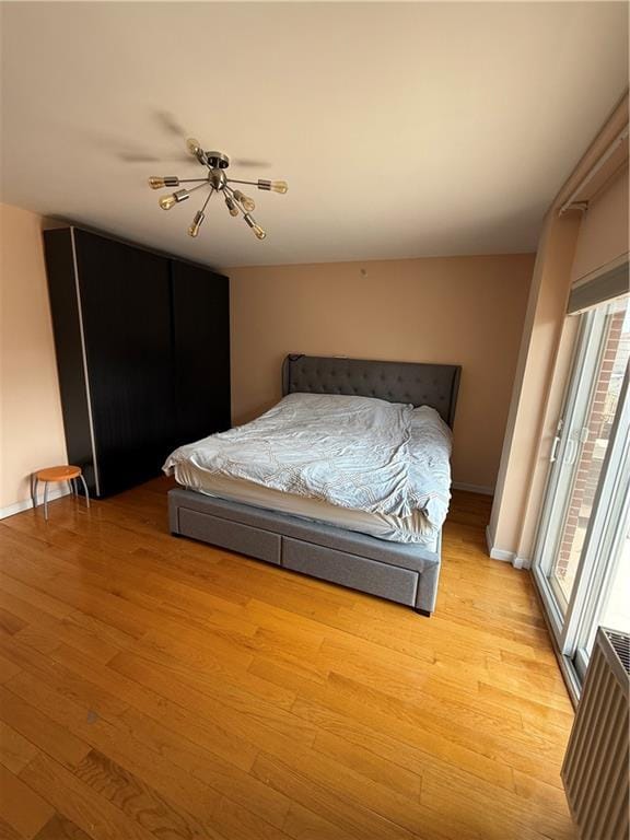 2964 Brighton 6th St Unit 4B, Brooklyn, NY 11235 - bedroom with light wood-type flooring and baseboards