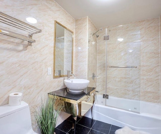 1587 E 19th St Unit 6K, Brooklyn, NY 11230 - full bathroom featuring tile walls and  shower combination
