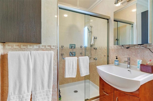 1650 68th St, Brooklyn, NY 11204 - full bathroom with vanity, a stall shower, and tile walls