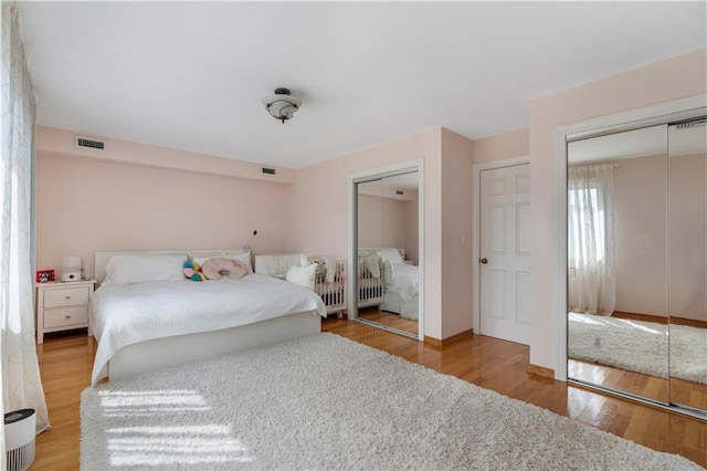 1650 68th St, Brooklyn, NY 11204 - bedroom featuring two closets and wood finished floors