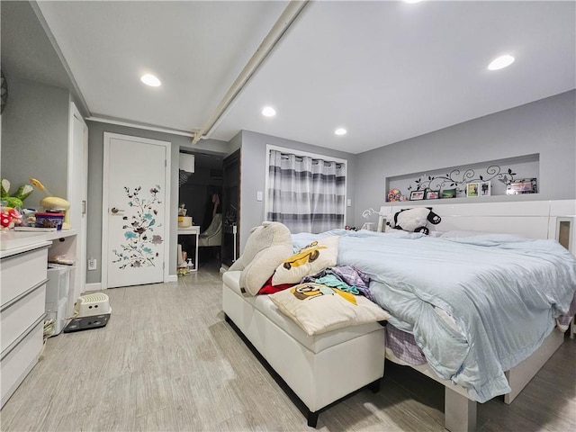 8219 7th Ave, Brooklyn, NY 11228 - bedroom with light wood-style flooring and recessed lighting