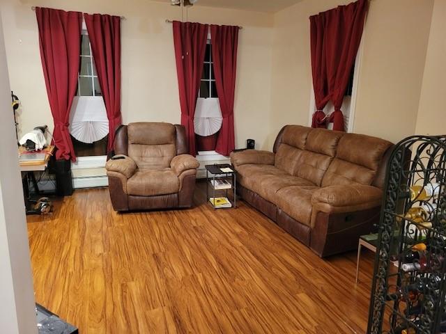 5463 Arthur Kill Rd, Staten Island, NY 10307 - living area with wood finished floors