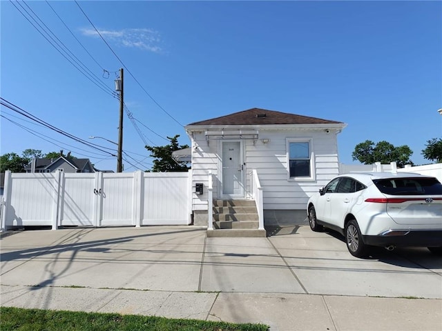 268 Nelson Ave, Staten Island, NY 10308 - view of front facade featuring a gate and a shingled roof