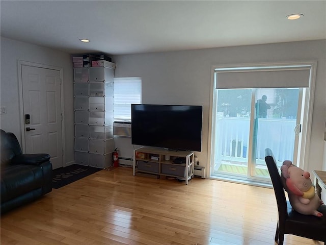 268 Nelson Ave, Staten Island, NY 10308 - living room with light wood-style flooring, healthy amount of natural light, recessed lighting, and baseboard heating
