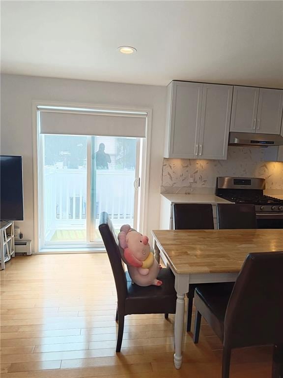268 Nelson Ave, Staten Island, NY 10308 - dining space with light wood finished floors, recessed lighting, and baseboard heating