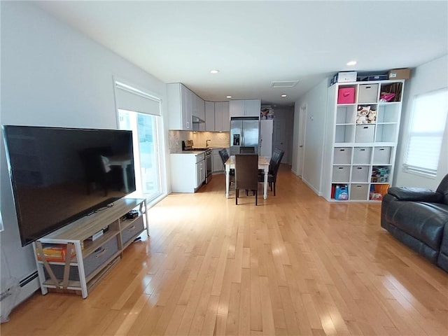268 Nelson Ave, Staten Island, NY 10308 - living room with light wood-style floors and recessed lighting