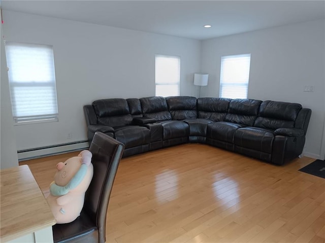 268 Nelson Ave, Staten Island, NY 10308 - living room with a baseboard radiator, light wood finished floors, and recessed lighting
