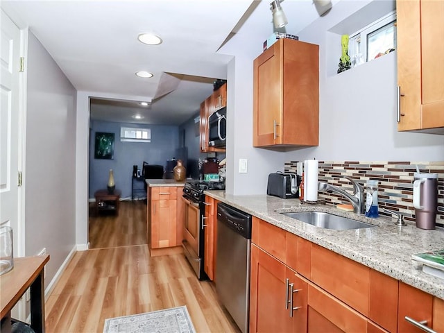 21 Stroud Ave, Staten Island, NY 10312 - kitchen with appliances with stainless steel finishes, light wood-style flooring, light stone counters, recessed lighting, and tasteful backsplash