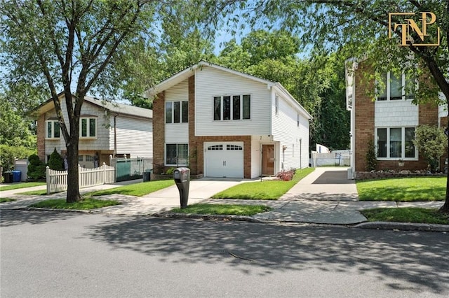 7 Kunath Ave, Staten Island, NY 10309 - view of front facade with driveway, an attached garage, and brick siding