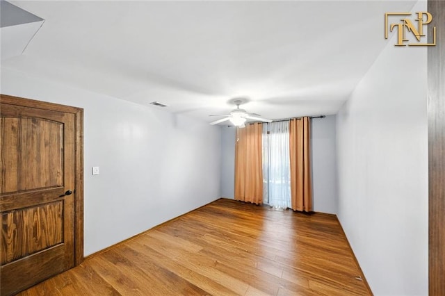 7 Kunath Ave, Staten Island, NY 10309 - empty room with ceiling fan and wood finished floors