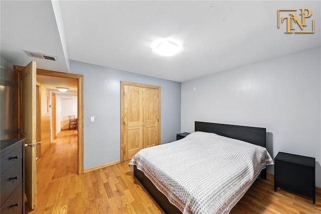 7 Kunath Ave, Staten Island, NY 10309 - bedroom with light wood-style floors and a closet