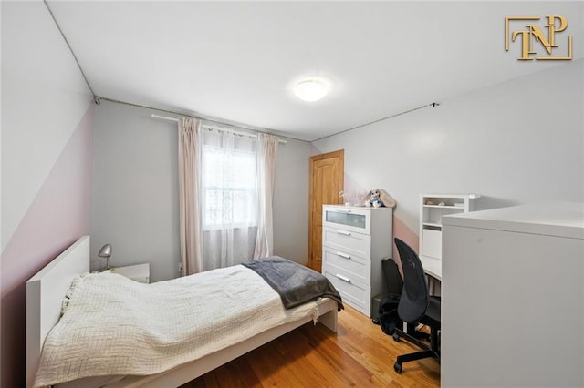 7 Kunath Ave, Staten Island, NY 10309 - bedroom featuring light wood finished floors and an office area
