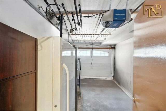 7 Kunath Ave, Staten Island, NY 10309 - garage with a garage door opener and baseboards