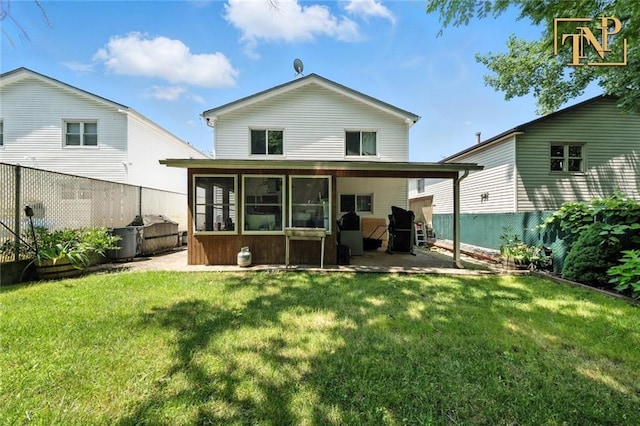 7 Kunath Ave, Staten Island, NY 10309 - back of property with a sunroom, a patio area, and a fenced backyard