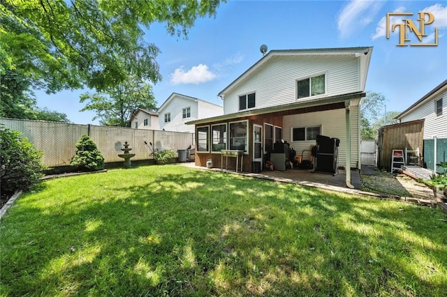 7 Kunath Ave, Staten Island, NY 10309 - rear view of house with a sunroom and a fenced backyard