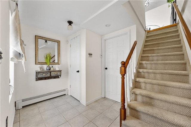 324 Norway Ave, Staten Island, NY 10305 - entrance foyer with a baseboard heating unit, stairs, and light tile patterned floors