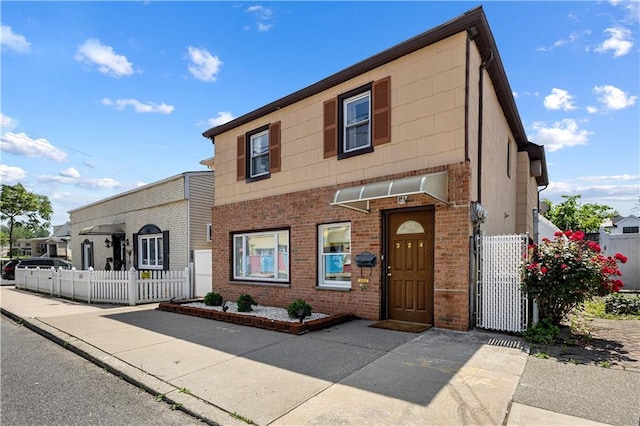 324 Norway Ave, Staten Island, NY 10305 - view of front of home with brick siding and a gate