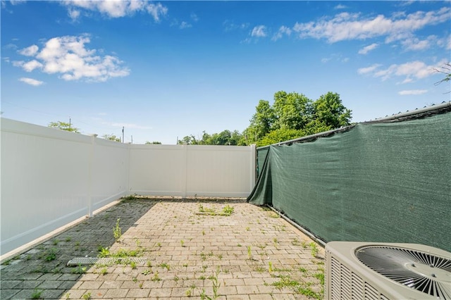 797 Father Capodanno Blvd, Staten Island, NY 10305 - fenced backyard featuring a patio area