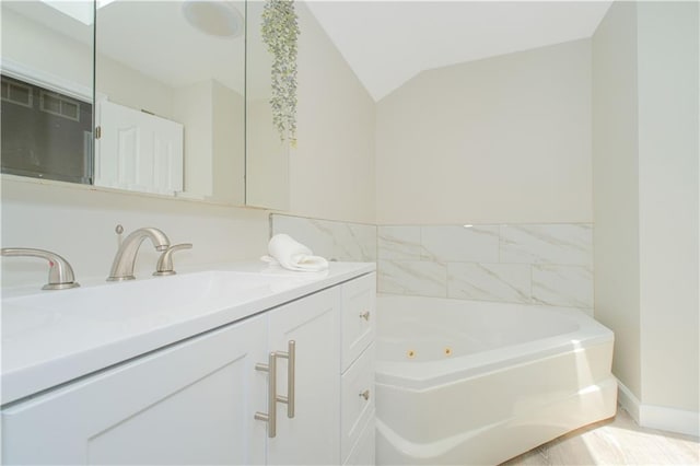 37 Quail Ln, Staten Island, NY 10309 - full bath featuring a whirlpool tub, vanity, and vaulted ceiling