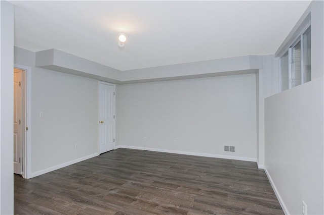 37 Quail Ln, Staten Island, NY 10309 - empty room with dark wood-style floors and baseboards
