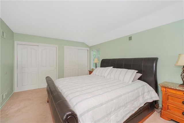 37 Quail Ln, Staten Island, NY 10309 - bedroom with multiple closets, light colored carpet, and lofted ceiling