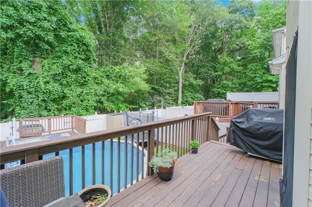 37 Quail Ln, Staten Island, NY 10309 - wooden deck featuring a grill and a fenced backyard