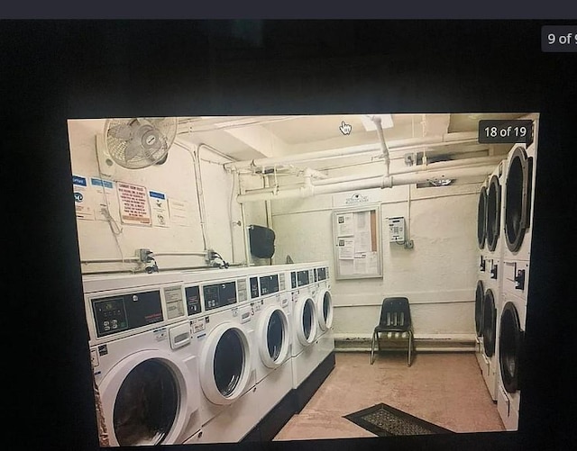 555 Bronx River Rd Unit 5E, Yonkers, NY 10704 - shared laundry room with washing machine and dryer