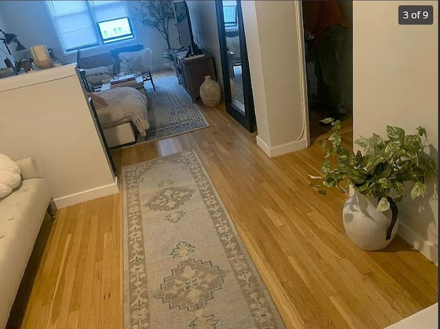 555 Bronx River Rd Unit 5E, Yonkers, NY 10704 - living area with wood finished floors and baseboards