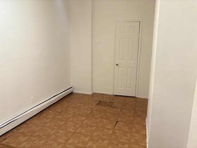 894 New Lots Ave, Brooklyn, NY 11208 - unfurnished room featuring baseboard heating