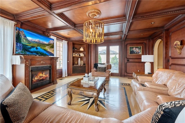 8524 Ridge Blvd, Brooklyn, NY 11209 - living room featuring inlaid floor details, ornamental molding, a chandelier, coffered ceiling, and a lit fireplace