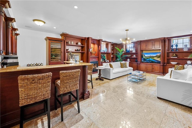 8524 Ridge Blvd, Brooklyn, NY 11209 - living area featuring beverage cooler, recessed lighting, and a chandelier