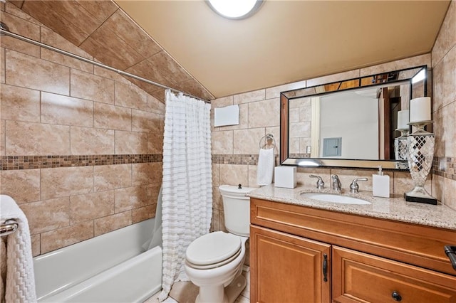 8524 Ridge Blvd, Brooklyn, NY 11209 - full bathroom featuring tile walls, vanity, shower / bath combination with curtain, lofted ceiling, and backsplash