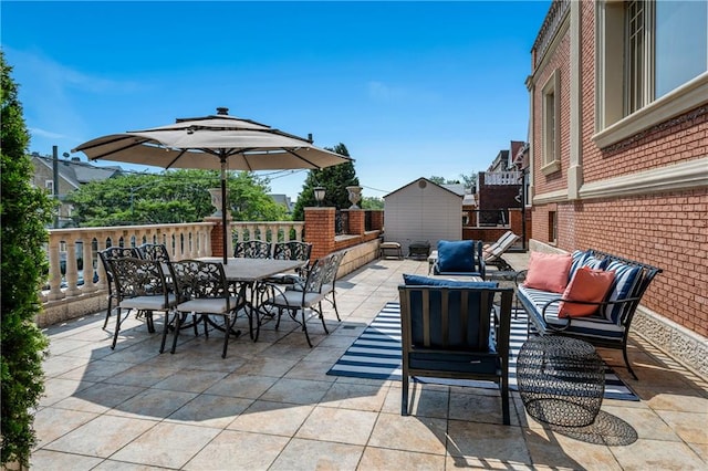 8524 Ridge Blvd, Brooklyn, NY 11209 - view of patio featuring outdoor dining space, a storage shed, and outdoor lounge area
