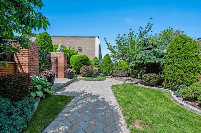 8524 Ridge Blvd, Brooklyn, NY 11209 - view of grassy yard with a patio