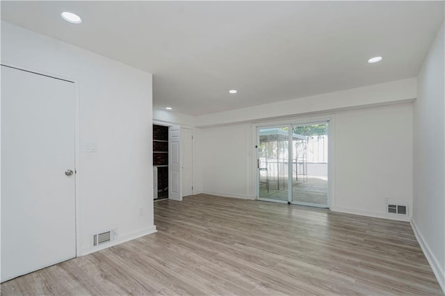 211 Dover Grn, Staten Island, NY 10312 - unfurnished room with light wood-type flooring and recessed lighting
