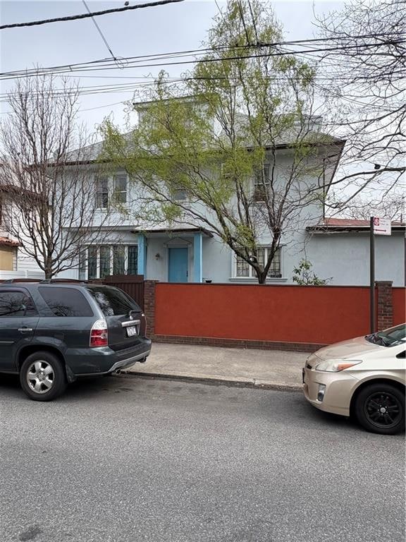 2339 80th St, Brooklyn, NY 11214 - view of front of property with stucco siding
