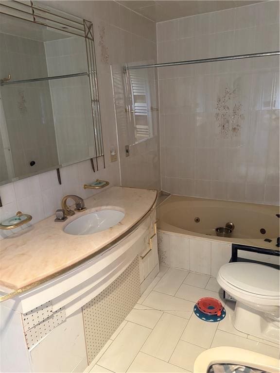 2339 80th St, Brooklyn, NY 11214 - bathroom with a whirlpool tub, tile patterned floors, and vanity