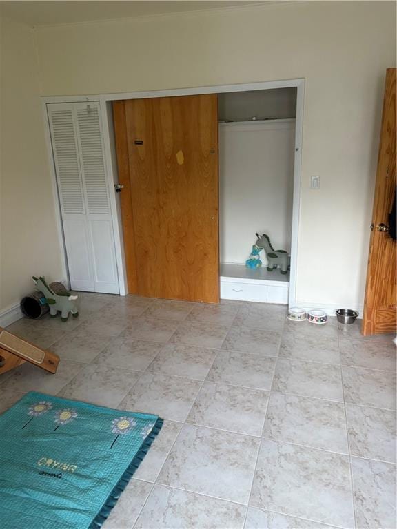 2339 80th St, Brooklyn, NY 11214 - unfurnished bedroom with a closet