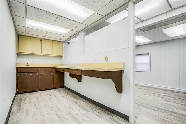 8301 4th Ave, Brooklyn, NY 11209 - kitchen with light wood-style floors and light countertops