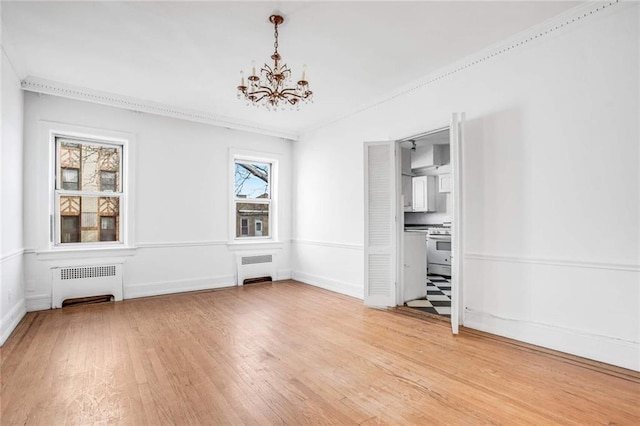 8301 4th Ave, Brooklyn, NY 11209 - unfurnished dining area featuring radiator heating unit, a chandelier, light wood-type flooring, and crown molding