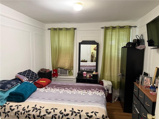 582 Williams Ave, Brooklyn, NY 11207 - bedroom featuring dark wood-type flooring and cooling unit