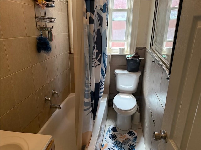 582 Williams Ave, Brooklyn, NY 11207 - full bathroom with shower / bath combo, tile walls, and tile patterned floors
