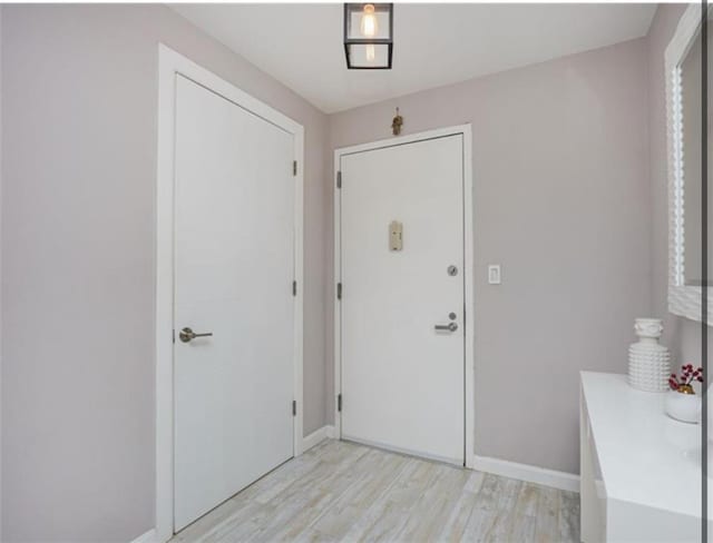 100 Oceana Dr W Unit 4J, Brooklyn, NY 11235 - foyer entrance with light wood-type flooring and baseboards